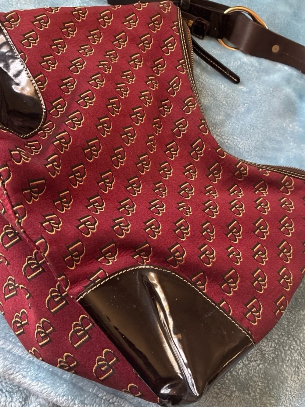 Dooney & Bourke Burgundy DB Monogram Hobo with Dark Brown Trim. Needs some TLC